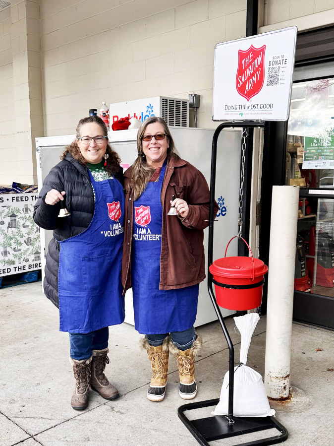 Camas-Washougal Salvation Army volunteers Janine Davis (left) and Mychele Crase ring bells in November 2024.