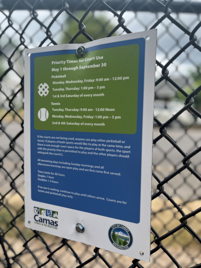 A sign at the Crown Park shared-use tennis-pickleball courts in Camas lists rules for use, Aug. 12, 2024.