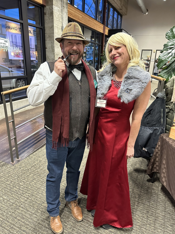 Robert Barber (left) and Anne McCranie dress in &ldquo;Clue&rdquo; costumes for the Downtown Camas Association&rsquo;s annual &ldquo;Clue&rdquo; themed First Friday event on Jan. 5, 2024. (Contributed photo courtesy of the DCA)